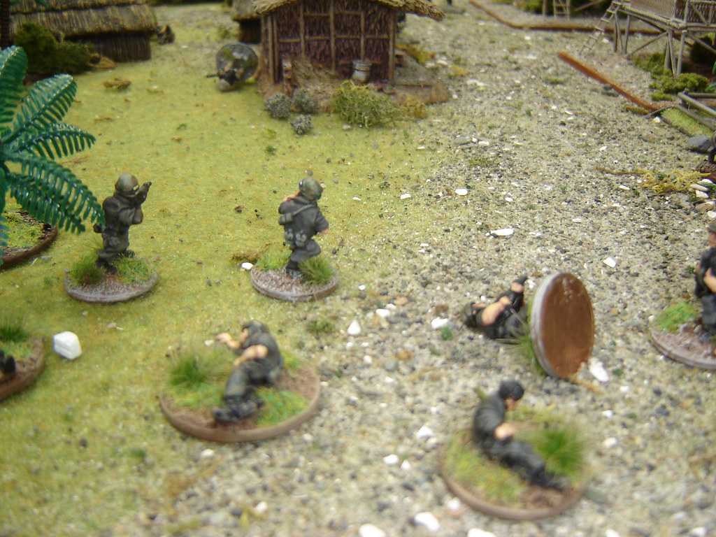 2nd Squad takes casualties as it assaults VC Command hut