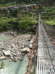 Bridge over to village in the Annapurna circuit