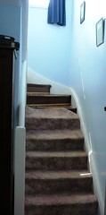 Carpet coming off the stairs