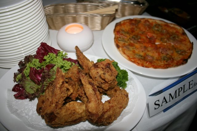 Deep-fried chicken wings and pizza from Cable Car