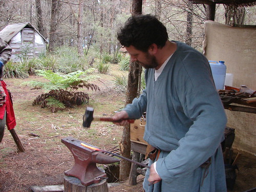 Adam impersonating a blacksmith