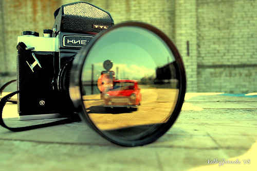 car reflection on lens by kathyJv