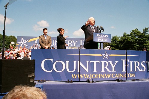 John Mc Cain and Sarah Palin with a huge banner Country First