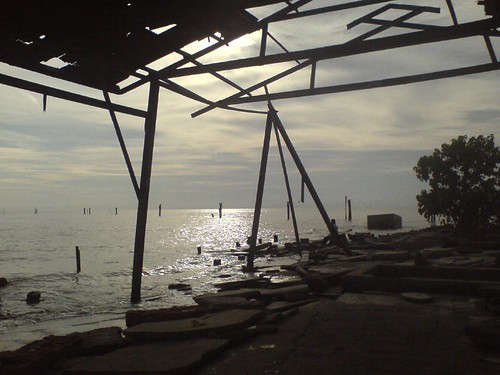 Broken buildings by the sea