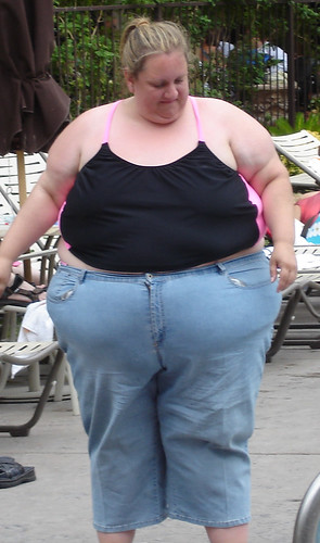 Big fat woman wearing denim and black top