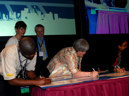 Leslie Lewis signs the Toronto Declaration