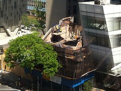 Workers tearing down 35 Cooper Square