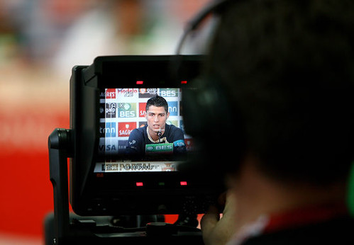 Cristiano Ronaldo talks to the media during a press conference at the Stade de la Maladiere