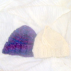 Hand spun, hand knit Suri alpaca baby hats