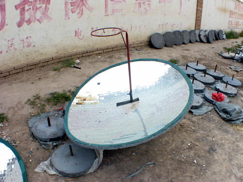 Solar cookers being assembled near Minlou, Gansu Province, China