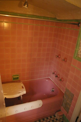 Pink and green tile bathroom