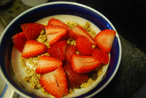 Coconut yogurt, granola, strawberries
