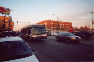 Southbound CTA Route # 54 Cicero Avenue bus at the intersection of west Belmont and North Cicero Avenues. Chicago Illinois. December 2003.