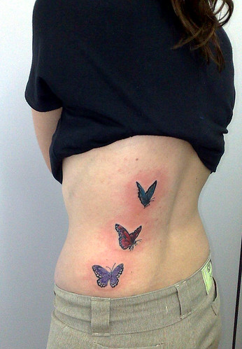 tattoo de borboletas. tatuagem borboletas nas costas