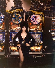 Elvira standing in front of her slot machines in 2002
