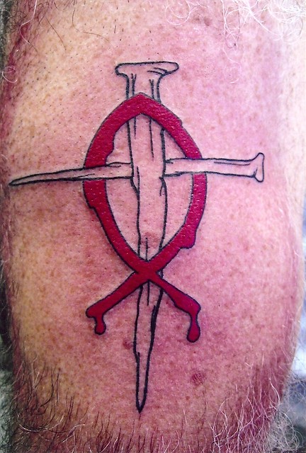 nail cross with fish tattoo