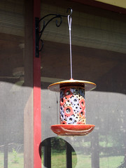 colorful ceramic birdfeeder