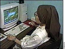 nun at computer