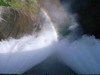 黒部ダムの放水と虹