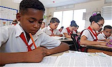 Cuban school children studying inside the revolutionary Caribbean-island nation. The UNESCO agency has recognized the high level of writing among the students. by Pan-African News Wire File Photos