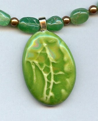 Green fish tail clay pendant