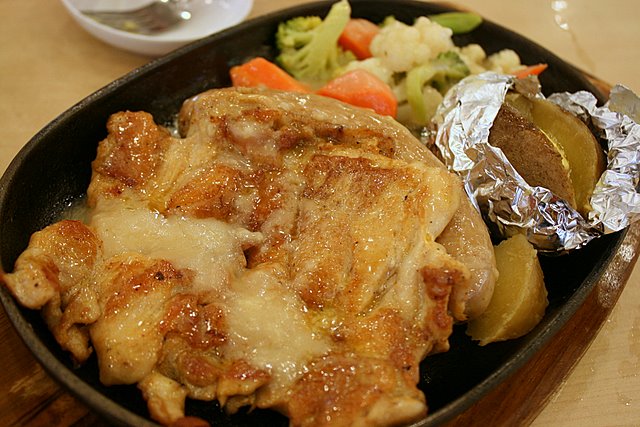 Chicken chop with German sausage on hotplate set (S$10.50)