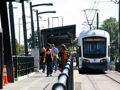 A Link train arrives at Othello Station in Rainier Valley. Photo by Oran Viriyincy.