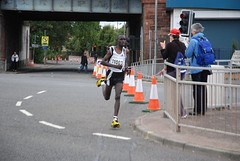 Race winner Emmanuel Mutai at mile 11