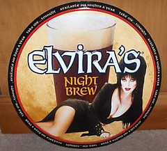 Elvira's Night Brew circular tin sign