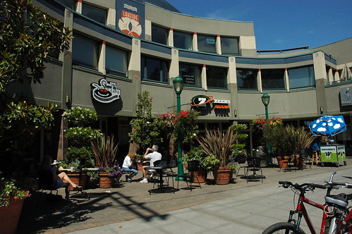 North Greenlake, business patio people, plants, bikes, ice cream stand, Seattle, Washington, USA by Wonderlane