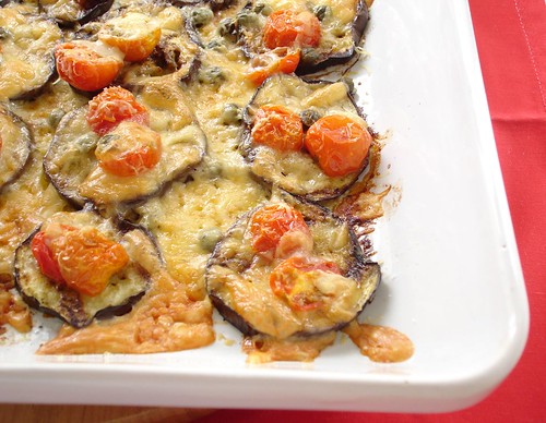Grilled eggplant with tomatoes and cheese