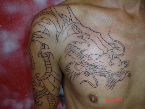 dragon outline tattoo Dejavu Tattoo Studio Chiangmai Thailand by augrust