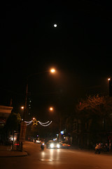 Hanoi street by night with moon