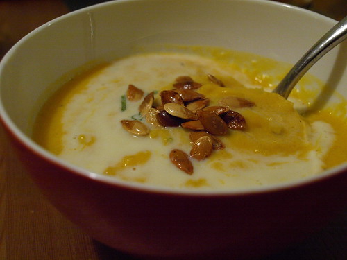 Pumpkin soup with brandy cream and toasted pumpkin seeds