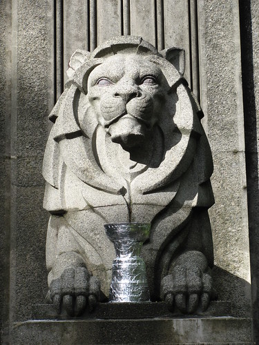 Stone Lion with Little Stanley Cup Between His Paws at Vancouver's Lions Gate Bridge