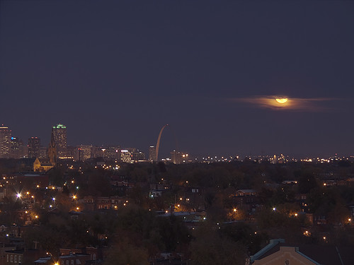 View from the top of the old South Side National Bank Tower, in Saint Louis, Missouri, USA - view of downtown at dusk with moonrise