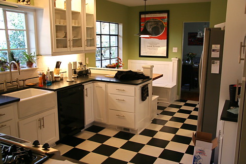 Bright green against the black and white tile gives a contemporary retro 