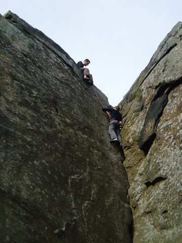 Phil climbing Green Gut at Froggatt Edge