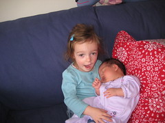 Emerson practicing being an older sister