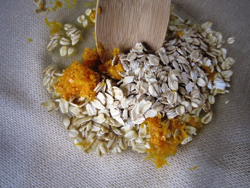 Mixing orange zest and oats
