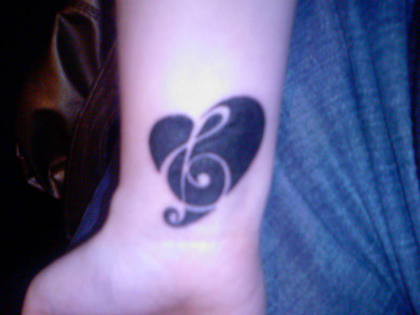 music tattoos for girls. Love of Music Tattoo