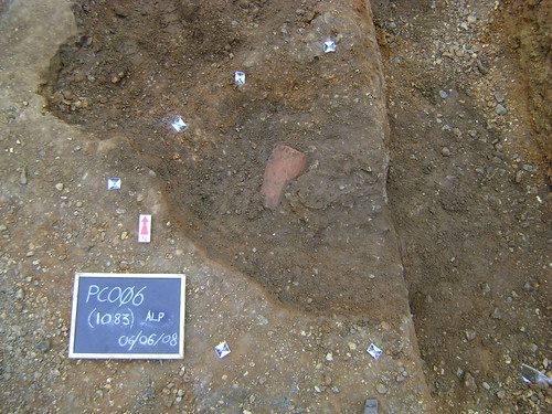 Inhumation (1083) with the head resting on a tile