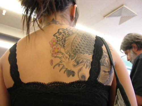 upper back tattoos women. Tattoo on Upper Back