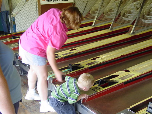 Nate playing Skee ball with Aunt amy