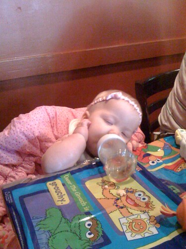 Leah asleep at the restaurant