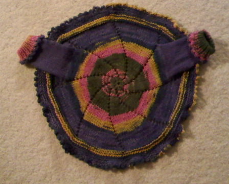 View of back of pinwheel sweater