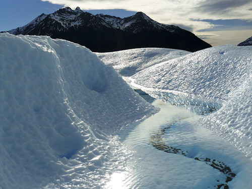mini rivers and streams formed on the surface of the glacier