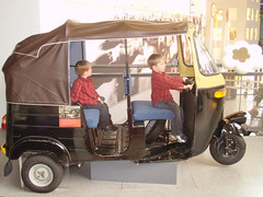 kids on some strange vehicle at the Centre for Life (flickr)