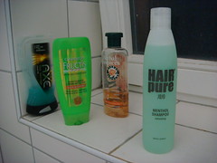 My bottle of Menthol Shampoo, next to my other shower supplies.