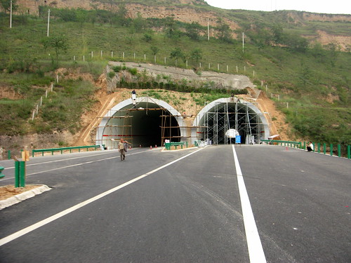 Tunnels on new expressway not open to traffic (but open to skateboards) approaching Yongshou, Shaanxi Province, China
